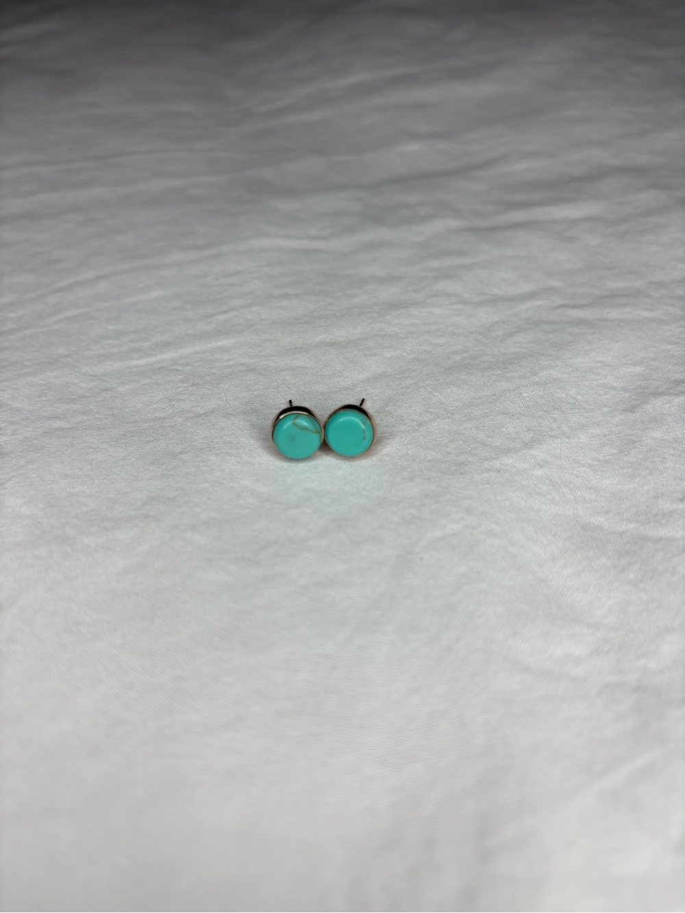 Turquoise stud earrings with rose gold accents marked 925